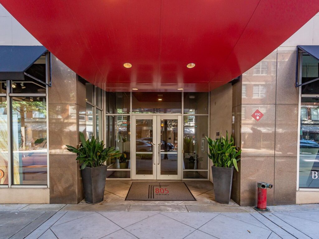 Façade of 805 Peachtree ST NE with red awning